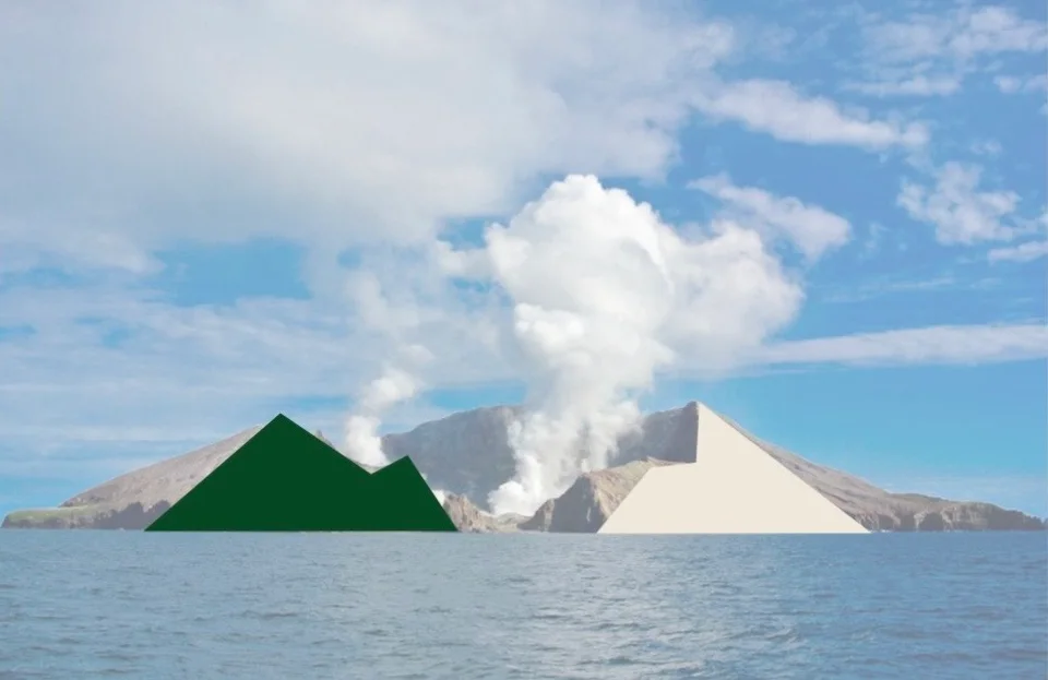Whakaari / White Island viewed from the water in 2019, with the TACEDGE brandmark peaks in front